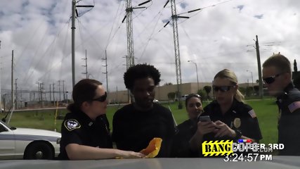 Busty Cops Take This Young Black Dude To A Hidden Roof Just To Bang His Cock With Their Fat Ass free video